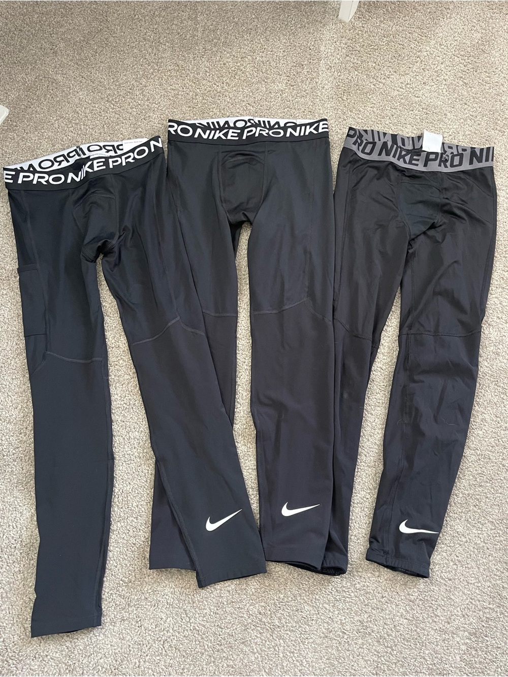 Nike Black with White Logo Kids Compression Leggings